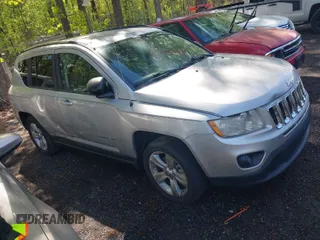 2011 Jeep Compass with VIN 1J4NT1FA1BD260206, listed as a IAAI auction lot 41917357 with 156,168 mi miles. Bid and sale history available at carsss.com. Image 1.