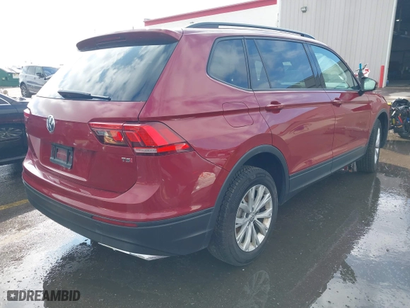 2018 Volkswagen Tiguan S with VIN 3VV1B7AX0JM043255, listed as a IAAI auction lot 41641512 with 79,069 mi miles. Bid and sale history available at carsss.com. Image 4.