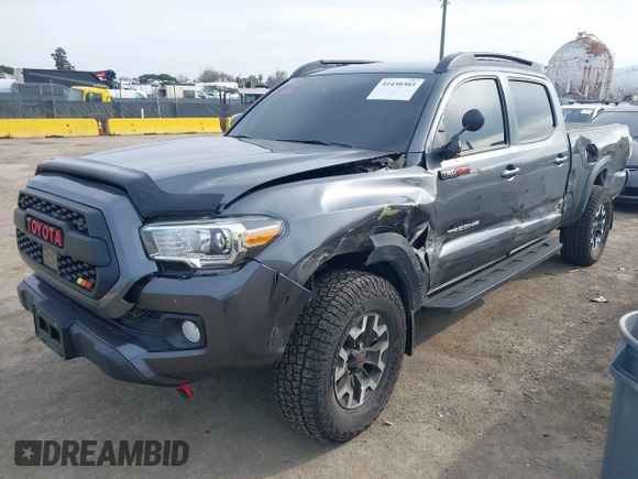 2021 Toyota Tacoma 4WD SR5 with VIN 3TMDZ5BN5MM110218, listed as a IAAI auction lot 41430303 with 47,781 mi miles. Bid and sale history available at carsss.com. Image 2.