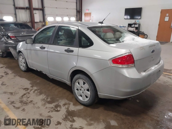 2009 Ford Focus S with VIN 1FAHP34N99W107098, listed as a IAAI auction lot 41610814 with 80,428 mi miles. Bid and sale history available at carsss.com. Image 3.