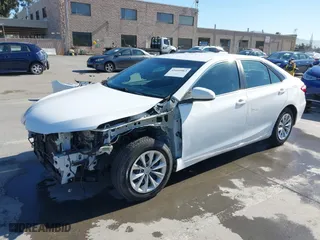 2015 Toyota Camry Hybrid LE with VIN 4T1BD1FK9FU155428, listed as a IAAI auction lot 41666063 with 154,608 mi miles. Bid and sale history available at carsss.com. Image 18.