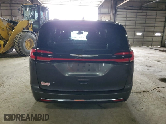2021 Chrysler Pacifica Touring L with VIN 2C4RC1BGXMR588001, listed as a Copart auction lot 54562505 with 128,350 mi miles and Salvage title. Bid and sale history available at DreamBid. Image 6.
