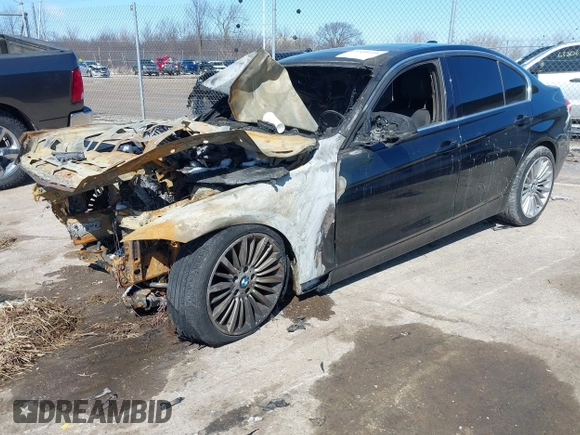 2013 BMW 3 Series 328i xDrive with VIN WBA3B5C54DF595768, listed as a IAAI auction lot 41856610 with 1 mi miles. Bid and sale history available at carsss.com. Image 2.