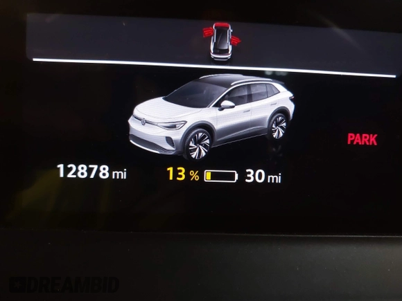 2023 Volkswagen ID.4 Pro z VIN 1V2DNPE84PC038042, wystawiony jako IAAI lot #41446269 z przebiegiem 12 878 mil mil oraz . Historia ofert i sprzedaży dostępna na DreamBid. Obrazek 7.