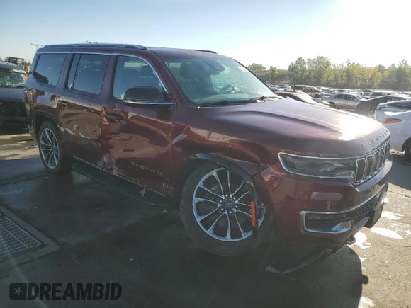 2023 Jeep Wagoneer Series II Carbide with VIN 1C4SJVBP3PS526909, listed as a Copart auction lot 74382694 with 21,949 mi miles and Salvage title. Bid and sale history available at DreamBid. Image 4.