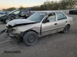 1998 Toyota Corolla VE with VIN 1NXBR12E4WZ110074, listed as a Copart auction lot 81803134 with Not provided miles and Salvage title. Bid and sale history available at DreamBid. Image 1.