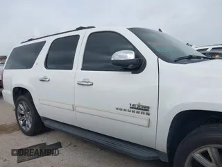 2011 Chevrolet Suburban LT with VIN 1GNSCJE05BR392834, listed as a IAAI auction lot 42141087 with 251,359 mi miles and . Bid and sale history available at DreamBid. Image 13.