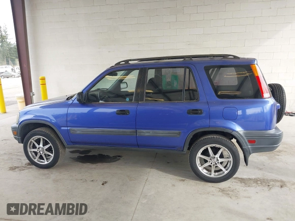 2001 Honda CR-V LX with VIN JHLRD28451C005857, listed as a IAAI auction lot 42004556 with 211,403 mi miles. Bid and sale history available at carsss.com. Image 14.