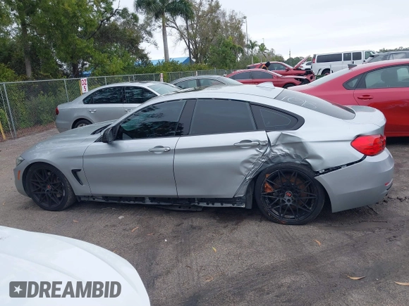 2015 BMW 4 Series 435i with VIN WBA4B1C58FG241018, listed as a IAAI auction lot 41401671 with 79,369 mi miles. Bid and sale history available at carsss.com. Image 14.