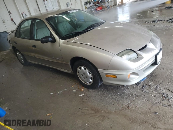 2002 Pontiac Sunfire SE z VIN 1G2JB524627155677, wystawiony jako Copart lot #55771625 z przebiegiem 169 305 mil mil oraz Szkoda całkowita • Salvage title. Historia ofert i sprzedaży dostępna na DreamBid. Obrazek 4.