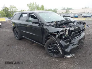 2017 Dodge Durango R/T with VIN 1C4SDJCTXHC878876, listed as a IAAI auction lot 42175360 with 61,323 mi miles and . Bid and sale history available at carsss.com. Image 1.