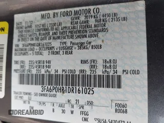 2013 Ford Fusion SE z VIN 3FA6P0HR1DR161025, wystawiony jako IAAI lot #42783917 z przebiegiem 172 329 mil mil oraz . Historia ofert i sprzedaży dostępna na DreamBid. Obrazek 9.