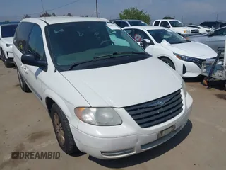 2007 Chrysler Town & Country with VIN 1A4GJ45R97B126697, listed as a IAAI auction lot 42180124 with 186,396 mi miles. Bid and sale history available at carsss.com. Image 1.