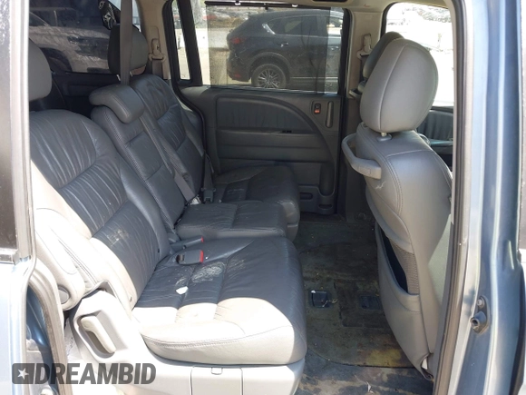 2007 Honda Odyssey EX-L with VIN 5FNRL38727B142735, listed as a IAAI auction lot 42093062 with 195,653 mi miles and . Bid and sale history available at DreamBid. Image 8.