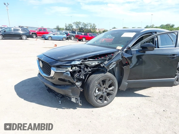 2022 Mazda CX-30 2.5 Turbo with VIN 3MVDMBAY4NM452705, listed as a IAAI auction lot 40101452 with 18,873 mi miles and . Bid and sale history available at DreamBid. Image 6.