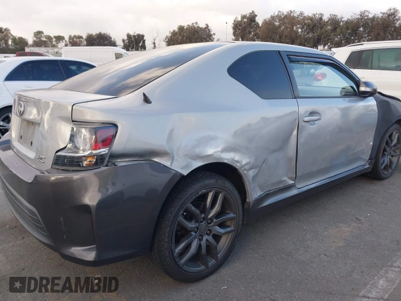 2014 Scion tC z VIN JTKJF5C79E3073875, wystawiony jako IAAI lot #41536021 z przebiegiem 158 154 mil mil oraz . Historia ofert i sprzedaży dostępna na DreamBid. Obrazek 17.