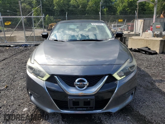 2016 Nissan Maxima SL with VIN 1N4AA6APXGC903559, listed as a Copart auction lot 61213525 with 124,575 mi miles and Salvage title. Bid and sale history available at DreamBid. Image 5.
