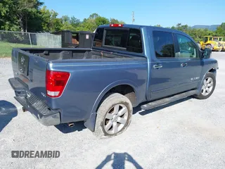 2011 Nissan Titan SL with VIN 1N6AA0EC7BN310833, listed as a IAAI auction lot 40140349 with 230,235 mi miles. Bid and sale history available at carsss.com. Image 4.