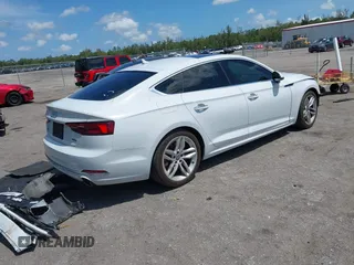 2019 Audi A5 Sportback Premium z VIN WAUANCF56KA080411, wystawiony jako IAAI lot #42208539 z przebiegiem 131 690 mil mil oraz . Historia ofert i sprzedaży dostępna na DreamBid. Obrazek 4.