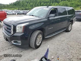 2019 GMC Yukon XL SLT with VIN 1GKS2GKC5KR166603, listed as a Copart auction lot 57913715 with 126,609 mi miles and Salvage title. Bid and sale history available at DreamBid. Image 1.