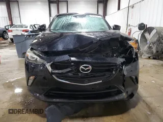 2018 Mazda CX-3 Touring z VIN JM1DKFC75J0301307, wystawiony jako Copart lot #56302175 z przebiegiem 107 676 mil mil oraz Szkoda całkowita • Salvage title. Historia ofert i sprzedaży dostępna na DreamBid. Obrazek 5.