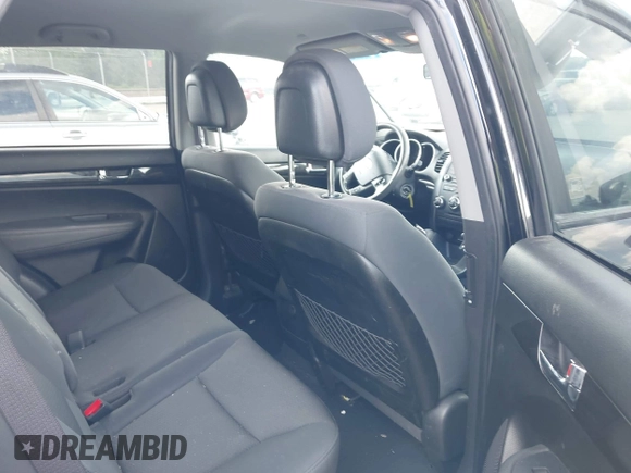 2013 Kia Sorento LX with VIN 5XYKTDA68DG408823, listed as a IAAI auction lot 42554361 with 221,917 mi miles and . Bid and sale history available at DreamBid. Image 8.