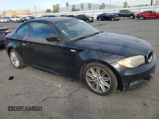 2012 BMW 1 Series 128i with VIN WBAUP9C55CVL91384, listed as a Copart auction lot 77684304 with 201,402 mi miles and Clean title. Bid and sale history available at DreamBid. Image 4.