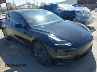 2021 Tesla Model 3 Long Range with VIN 5YJ3E1EB2MF065583, listed as a IAAI auction lot 42067399 with 52,333 mi miles. Bid and sale history available at carsss.com. Image 1.