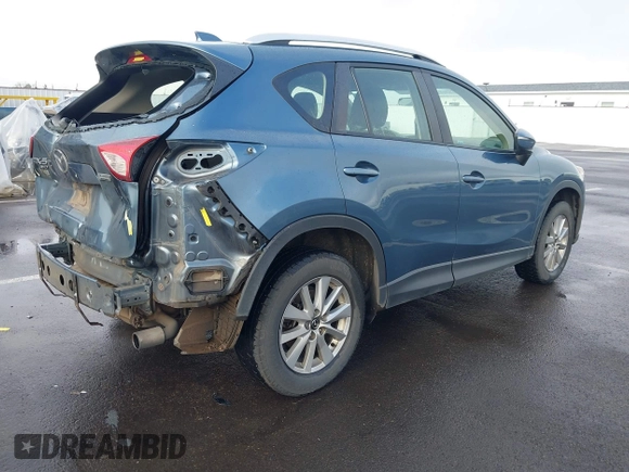 2015 Mazda CX-5 Sport with VIN JM3KE4BY0F0507727, listed as a IAAI auction lot 41249151 with 95,343 mi miles. Bid and sale history available at carsss.com. Image 4.