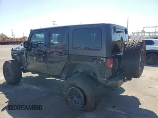 2014 Jeep Wrangler Unlimited Sahara z VIN 1C4BJWEG4EL164226, wystawiony jako Copart lot #53849355 z przebiegiem 82 145 mil mil oraz Szkoda całkowita • Salvage title. Historia ofert i sprzedaży dostępna na DreamBid. Obrazek 2.