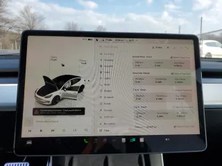 2022 Tesla Model 3 Long Range with VIN 5YJ3E1EBXNF272496, listed as a Copart auction lot 43973435 with 28,450 mi miles and Salvage Title. Bid and sale history available at DreamBid. Image 9.
