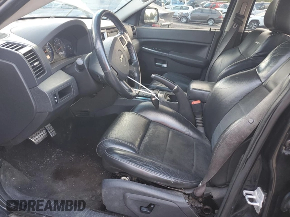 2008 Jeep Grand Cherokee SRT-8 with VIN 1J8HR78368C223775, listed as a Copart auction lot 76807824 with 156,937 mi miles and Clean Title. Bid and sale history available at carsss.com. Image 7.
