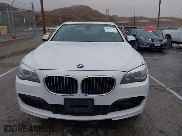 2013 BMW 7 Series 740i with VIN WBAYA6C57DC995338, listed as a IAAI auction lot 41479077 with 123,680 mi miles and . Bid and sale history available at DreamBid. Image 12.