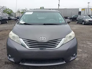 2014 Toyota Sienna XLE with VIN 5TDYK3DC0ES436502, listed as a IAAI auction lot 42180990 with 154,839 mi miles and . Bid and sale history available at DreamBid. Image 13.
