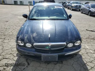 2004 Jaguar X-Type with VIN SAJEA51C74WD56736, listed as a Copart auction lot 48038295 with 115,817 mi miles and Salvage Title. Bid and sale history available at DreamBid. Image 5.