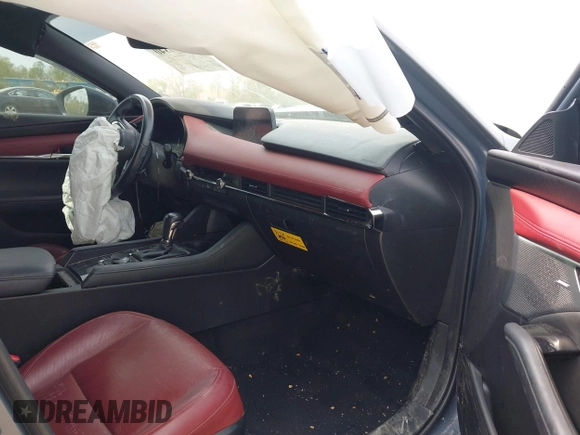 2020 Mazda 3 Premium with VIN JM1BPBNM3L1171285, listed as a IAAI auction lot 42097340 with 50,799 mi miles and . Bid and sale history available at DreamBid. Image 5.