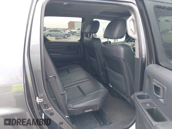 2014 Honda Ridgeline RTL with VIN 5FPYK1F50EB002577, listed as a IAAI auction lot 41931258 with 147,665 mi miles. Bid and sale history available at carsss.com. Image 8.