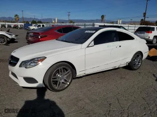 2015 Mercedes-Benz E-Class E 400 with VIN WDDKJ6FB0FF294447, listed as a Copart auction lot 84929364 with 96,689 mi miles and Salvage Title. Bid and sale history available at carsss.com. Image 1.