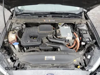 2016 Ford Fusion Titanium Hybrid z VIN 3FA6P0RU5GR356987, wystawiony jako Copart lot #48211775 z przebiegiem 145 192 mil mil oraz Szkoda całkowita • Salvage title. Historia ofert i sprzedaży dostępna na DreamBid. Obrazek 13.