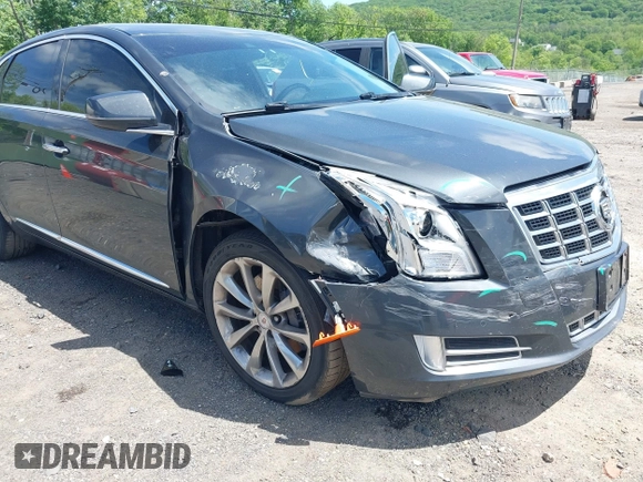 2013 Cadillac XTS Luxury z VIN 2G61R5S33D9101434, wystawiony jako IAAI lot #42290199 z przebiegiem 48 075 mil mil oraz . Historia ofert i sprzedaży dostępna na DreamBid. Obrazek 17.