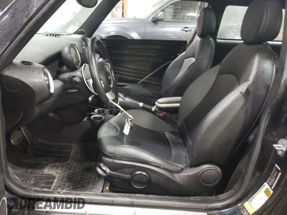 2007 MINI Hardtop S with VIN WMWMF73547TL90560, listed as a Copart auction lot 42565685 with 57,066 mi miles and Salvage Title. Bid and sale history available at DreamBid. Image 7.