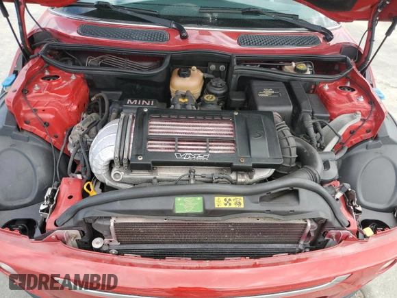 2006 MINI Hardtop S z VIN WMWRE33586TJ35233, wystawiony jako Copart lot #55118115 z przebiegiem 126 066 mil mil oraz Szkoda całkowita • Salvage title. Historia ofert i sprzedaży dostępna na DreamBid. Obrazek 11.
