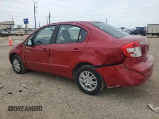 2012 Suzuki SX4 LE z VIN JS2YC5A33C6304897, wystawiony jako Copart lot #55567505 z przebiegiem 42 968 mil mil oraz Szkoda całkowita • Salvage title. Historia ofert i sprzedaży dostępna na DreamBid. Obrazek 2.
