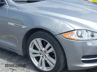 2013 Jaguar XJ with VIN SAJWJ1CD4D8V46305, listed as a IAAI auction lot 42637329 with 101,532 mi miles and . Bid and sale history available at DreamBid. Image 6.