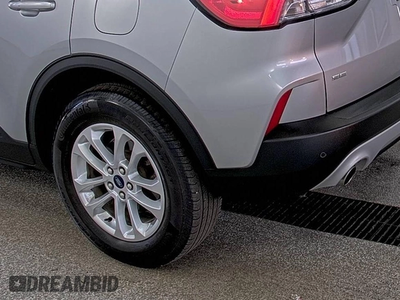 2022 Ford Escape SE with VIN 1FMCU9G65NUB41402, listed as a IAAI auction lot 42733931 with 62,151 mi miles and . Bid and sale history available at DreamBid. Image 21.