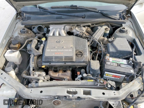 2002 Toyota Avalon XL z VIN 4T1BF28B22U200555, wystawiony jako Copart lot #54544265 z przebiegiem 146 031 mil mil oraz Czysty tytuł • Clean title. Historia ofert i sprzedaży dostępna na DreamBid. Obrazek 11.