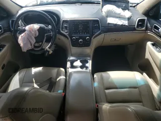 2014 Jeep Grand Cherokee Limited z VIN 1C4RJFBG5EC545425, wystawiony jako Copart lot #54035445 z przebiegiem 135 309 mil mil oraz Szkoda całkowita • Salvage title. Historia ofert i sprzedaży dostępna na DreamBid. Obrazek 8.