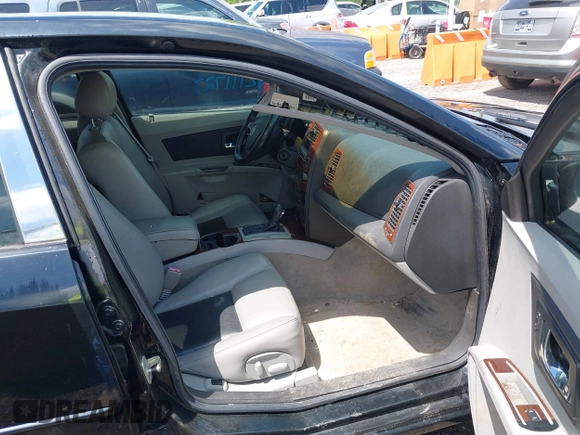 2004 Cadillac CTS with VIN 1G6DM577040128494, listed as a IAAI auction lot 42111727 with 102,142 mi miles. Bid and sale history available at carsss.com. Image 5.
