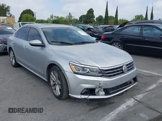 2017 Volkswagen Passat SE with VIN 1VWGT7A35HC061276, listed as a IAAI auction lot 42225030 with 134,650 mi miles and . Bid and sale history available at DreamBid. Image 1.