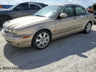 2004 Jaguar X-Type with VIN SAJEA51C34WE03194, listed as a Copart auction lot 78980144 with 51,164 mi miles and Clean Title. Bid and sale history available at carsss.com. Image 1.